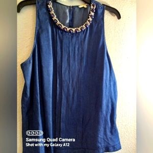 Cute blouse with bejeweled neckline